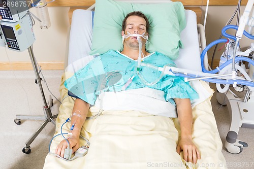 Image of Patient With Endotracheal Tube Resting In Hospital