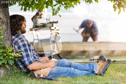 Image of Carpenter Taking a Break