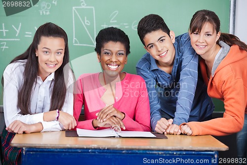 Image of Teacher With Teenage Students In Classroom