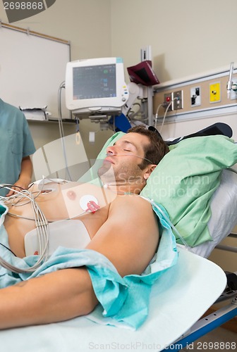 Image of Patient With Holter Monitor Stuck To Chest