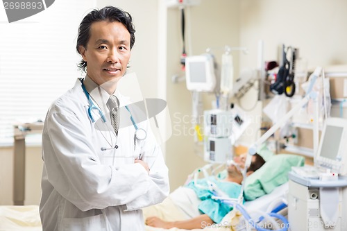 Image of Confident Doctor With Patient Resting In Hospital