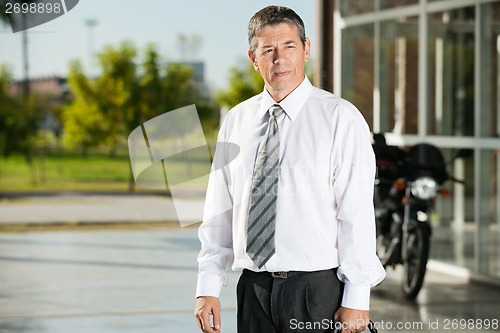 Image of Teacher Looking Away While At College Campus