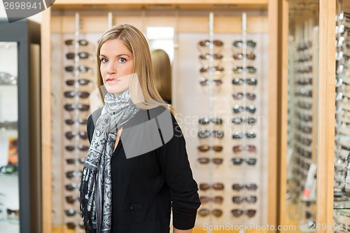 Image of Woman Standing In Glasses Store