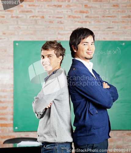 Image of Students Standing Arms Crossed In Classroom