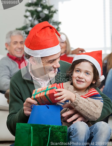 Image of Son And Father With Christmas Presents