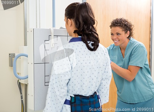 Image of Female Patient Getting Chest Xray