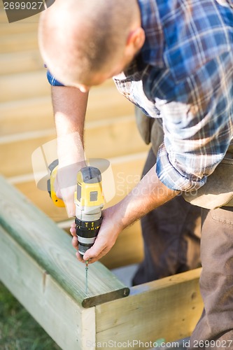 Image of Carpenter Building Deck