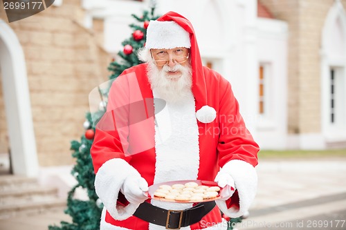 Image of Santa Claus Offering Cookies