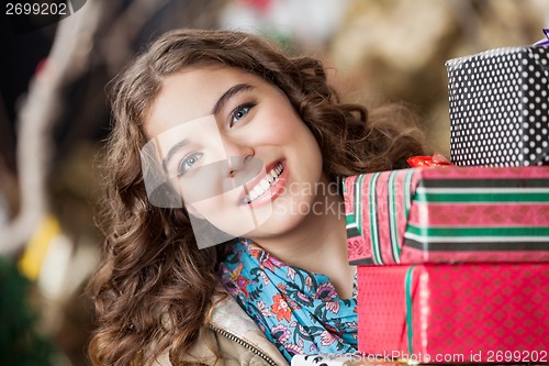 Image of Attractive Woman With Christmas Presents In Store