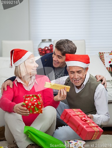 Image of Happy Family With Christmas Gifts