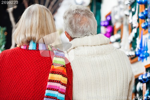 Image of Senior Couple At Christmas Store