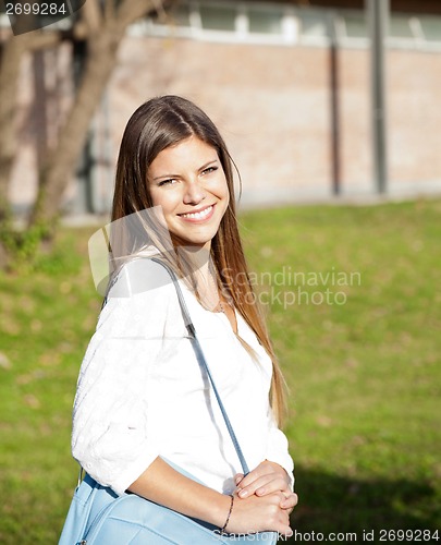 Image of Student Carrying Shoulder Bag On College Campus