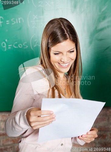 Image of Student Looking At Exam Result In Classroom