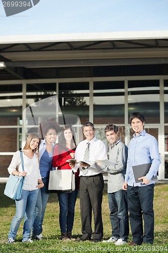 Image of Professor With Students Standing On University Campus