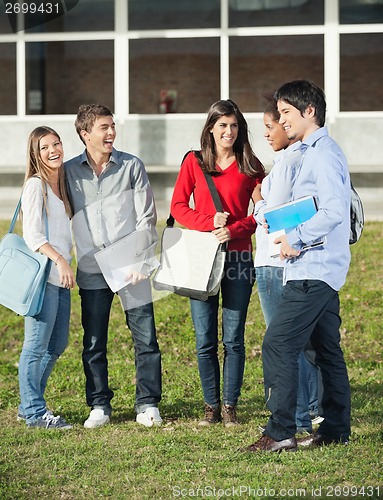 Image of Happy Students Standing On College Campus