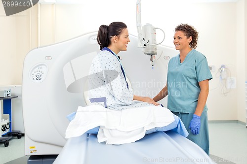 Image of Nurse And Patient In CT Scan Room