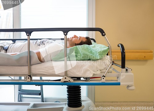 Image of Patient Lying On Bed In Hospital