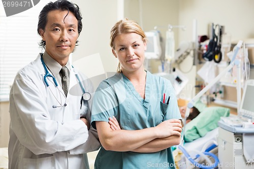 Image of Confident Doctor And Nurse In Hospital