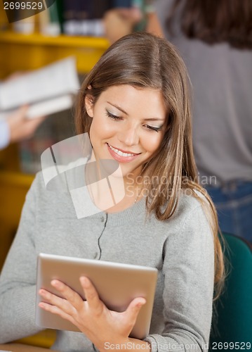 Image of Student With Digital Tablet Studying In University Library