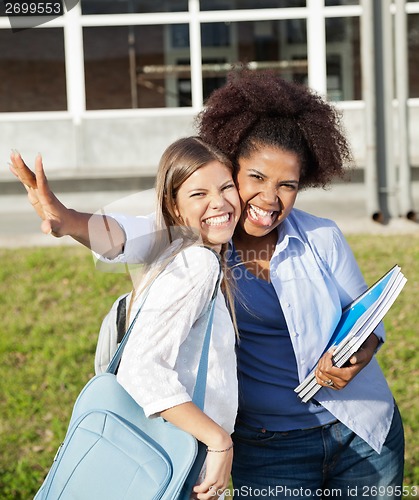 Image of Female Students Making Facial Expressions On Campus