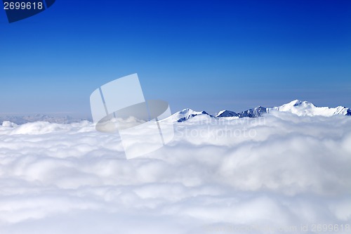 Image of Mountains under clouds at nice day