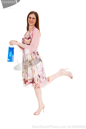 Image of Girl holding shopping bag.