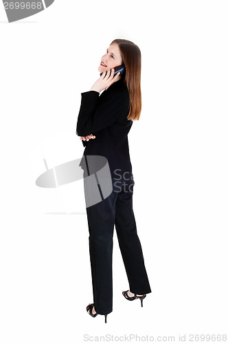 Image of Business woman on cell phone.