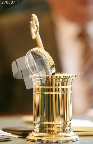 Image of Cup with office accessories.