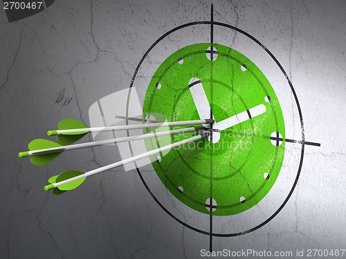 Image of Time concept: arrows in Clock target on wall background