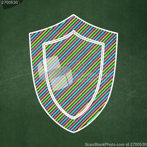 Image of Security concept: Shield on chalkboard background