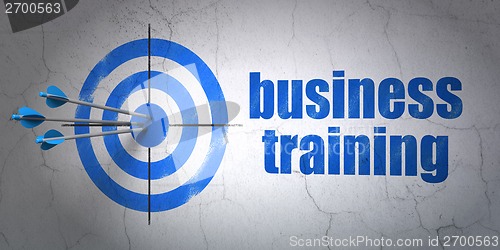 Image of Education concept: target and Business Training on wall background