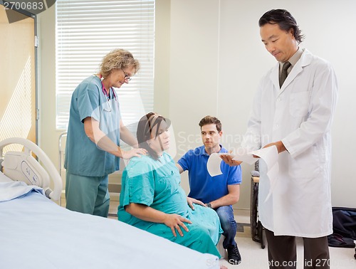 Image of Mother Giving Birth in Hospital