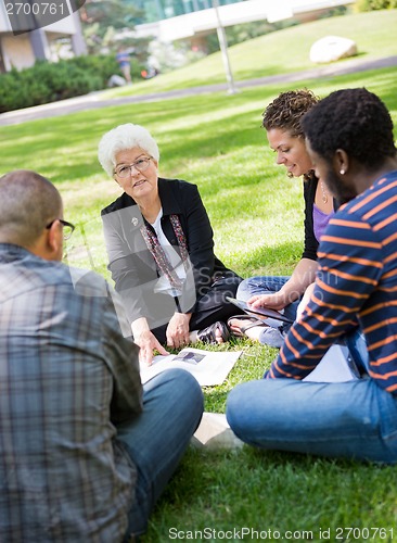 Image of University Professor Outdoors with Students