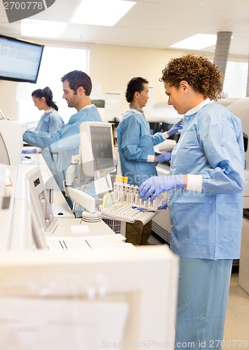 Image of Scientists Working In Laboratory