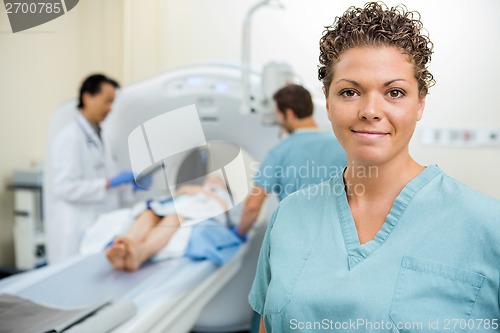 Image of Nurse With Doctor And Colleague