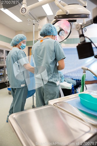 Image of Female Nurses Preparing Patient Before Operation