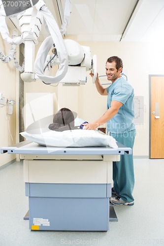 Image of Nurse Adjusting Xray Machine For Patient