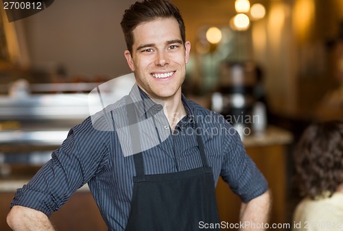 Image of Happy Male Owner In Cafe