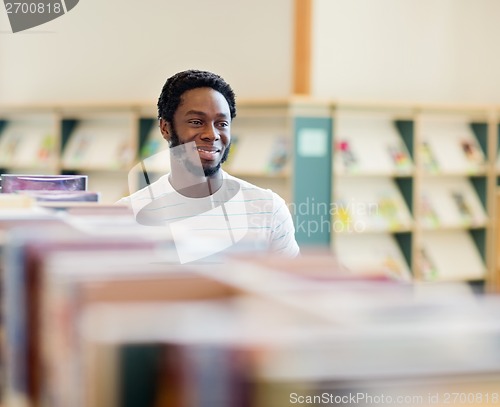 Image of Librarian Looking Away In Library