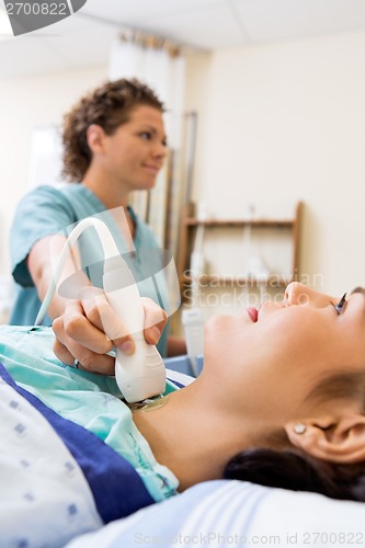 Image of Patient Undergoing Ultrasound Test Of Neck