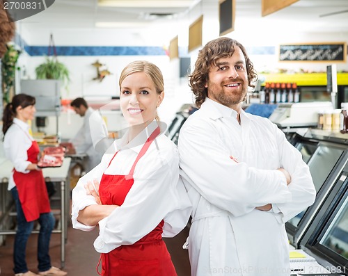 Image of Confident Butchers Standing Arms Crossed