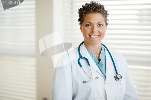Image of Cancer Specialist In Labcoat Standing At Clinic