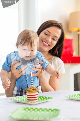 Image of Mother With Baby Boy Celebrating Birthday At Home
