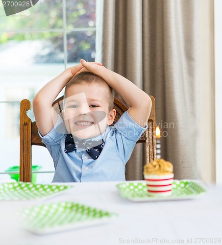 Image of Mother With Boy Celebrating Birthday At Home
