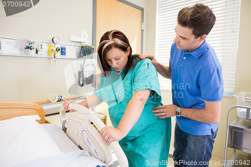 Image of Husband and Wife during Child Birth