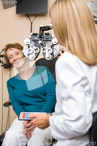 Image of Smiling Senior Woman Undergoing Eye Checkup