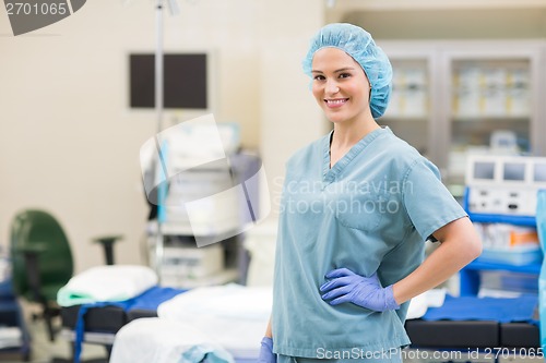 Image of Surgeon With Hand On Hip In Operation Room