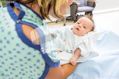 Image of Woman Playing With Cute Babygirl In Hospital