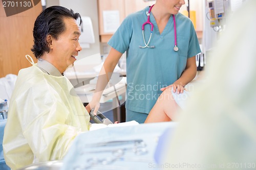 Image of Doctor Giving Good News to Birthing Mother