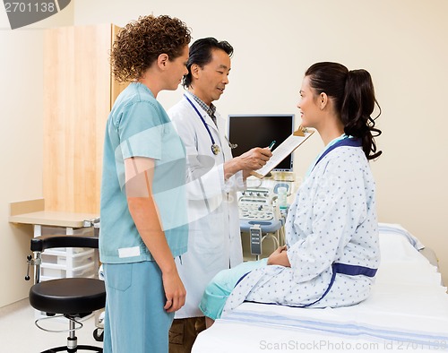 Image of Medical Team With Patient In Ultrasound Room